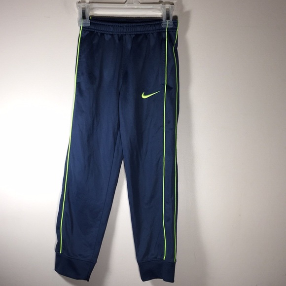 yellow nike track pants